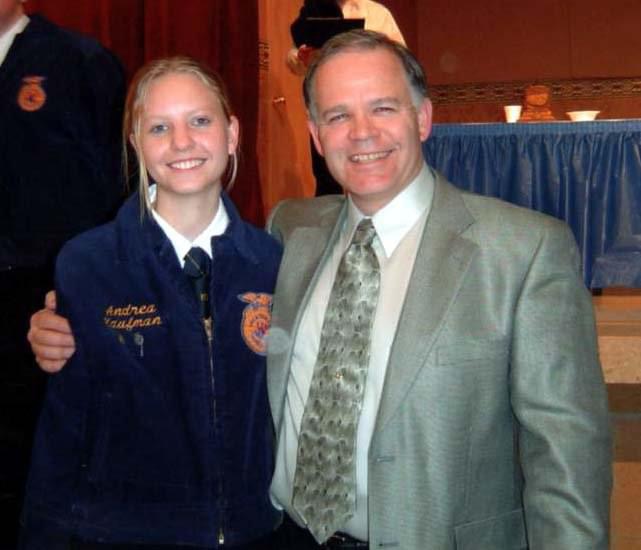 Andrea Clinkscales, as an FFA student, smiles beside her advisor.