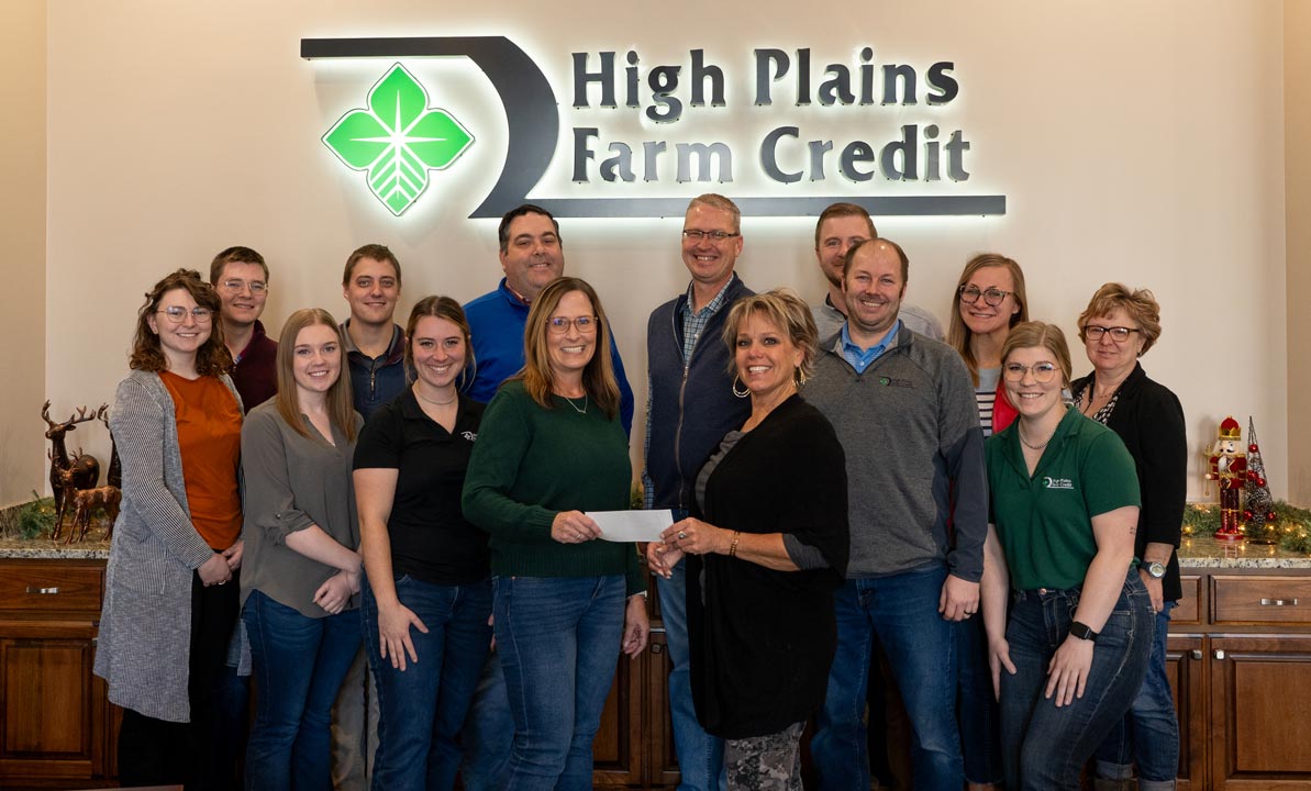 Hays staff presents CASA of the High Plains with a donation as part of 2023 December Giving.