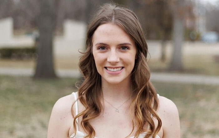 2024 Summer Intern, Regan Ast, in an outdoor setting.