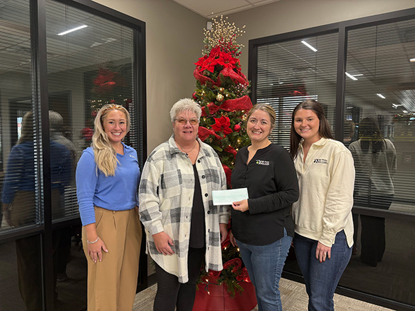 Dodge City staff present a check to the Crisis Center of Dodge City as part of 2025 December Giving.