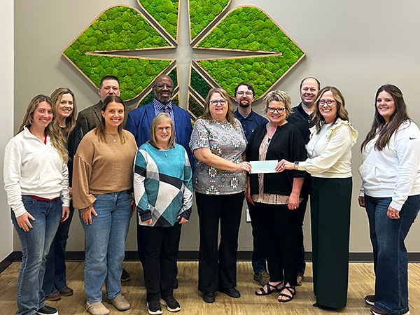Hays staff present a check to the Ellis County Ministerial Alliance as part of 2025 December Giving.