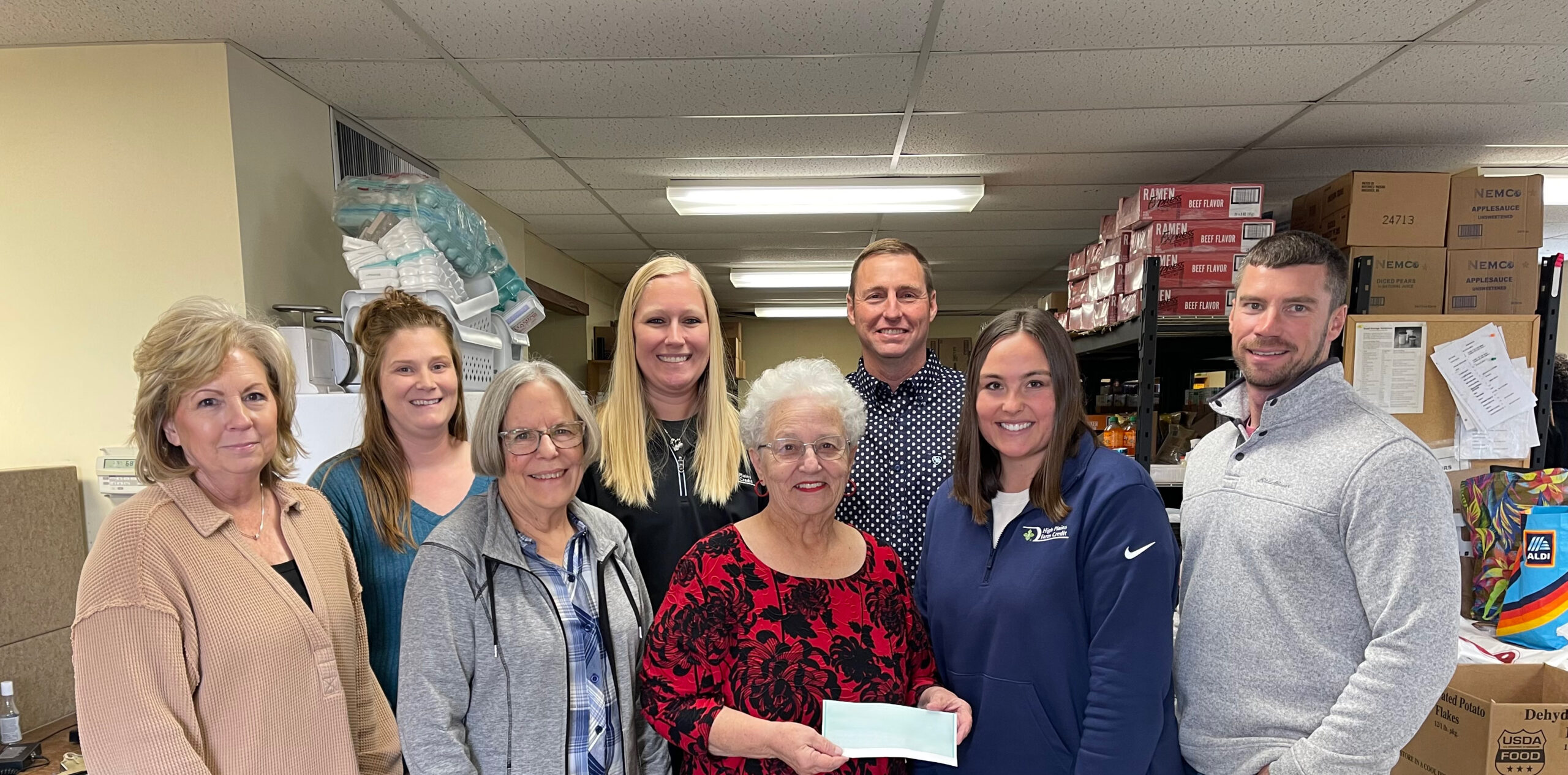 Pratt staff present a check to the Kingman Area Ministries Food Bank as part of 2025 December Giving.