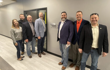 High Plains Farm Credit team members and a representative from CoBank explore the new Fort Hays Tech | North Central Construction Programs Building and the classroom named in honor of the association.